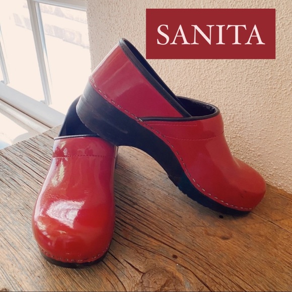 red patent clogs